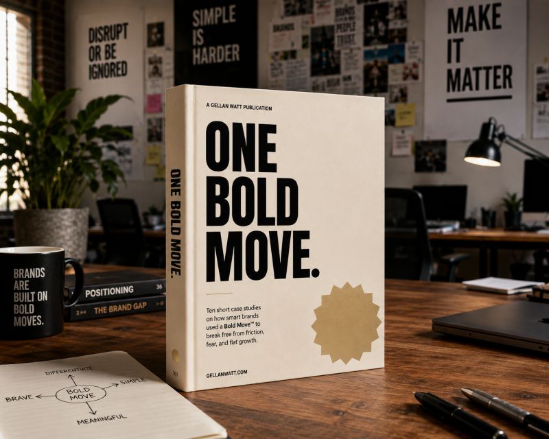 The physical One Bold Move book by Gellan Watt on a studio desk